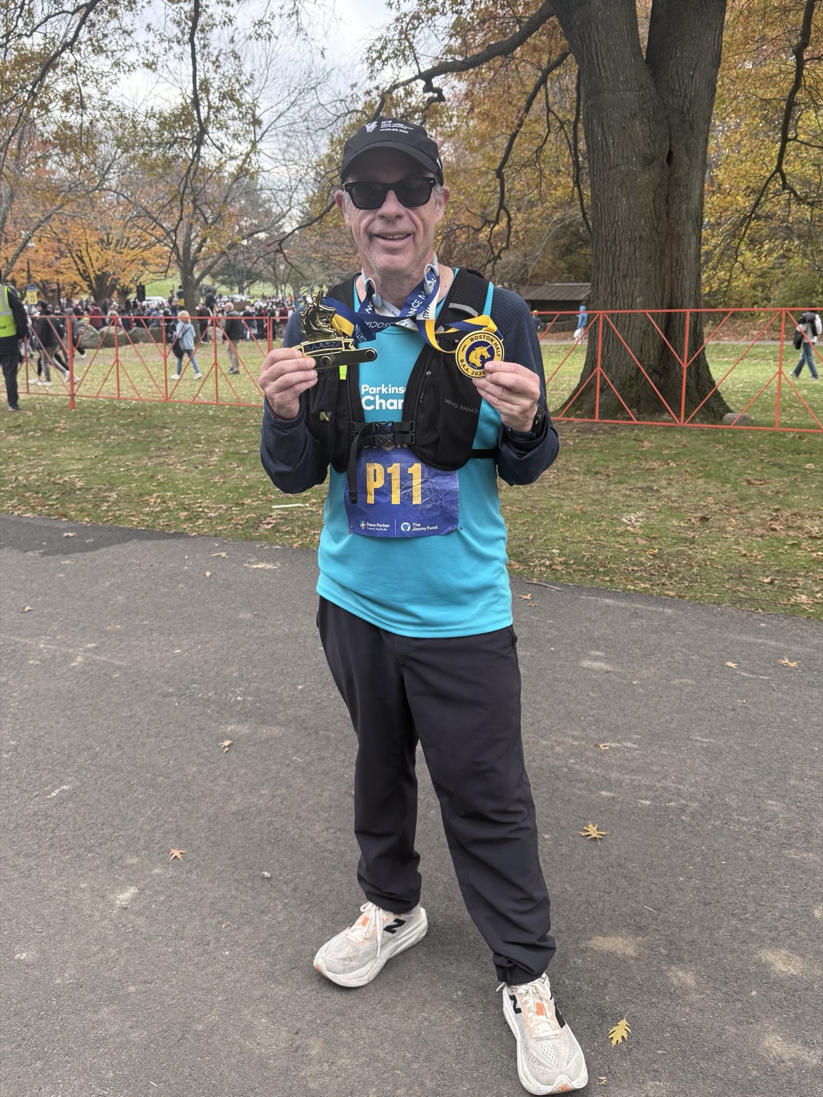 Dan Alperin with his running group after the 2025 TCS New York City Marathon