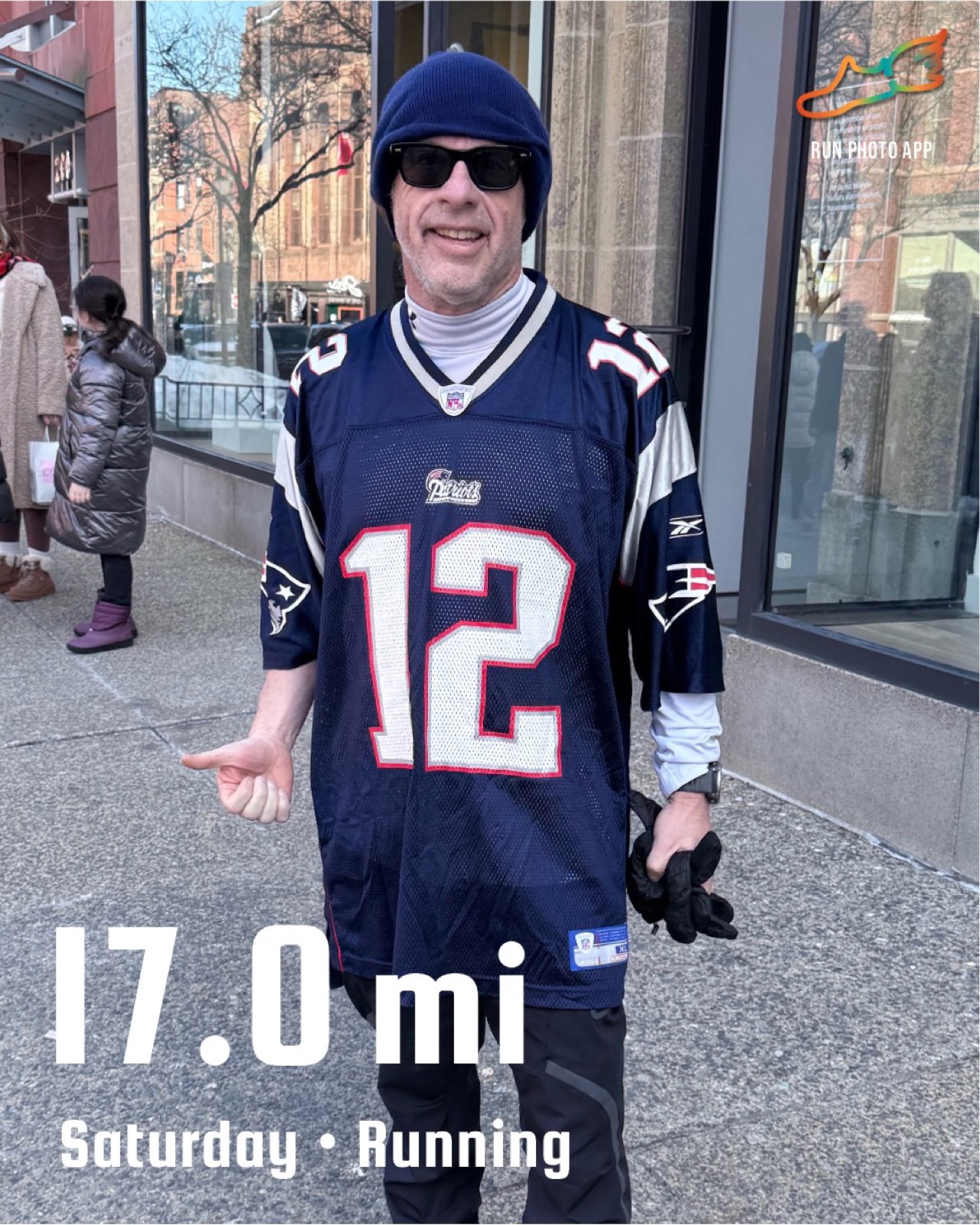 Dan Alperin on a 17-mile Patriots Day training run through Boston wearing a New England Patriots jersey